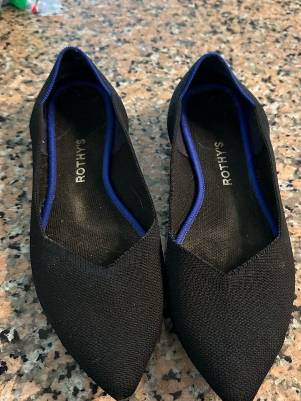 Rothy's Black Pointed Flats with Blue Trim